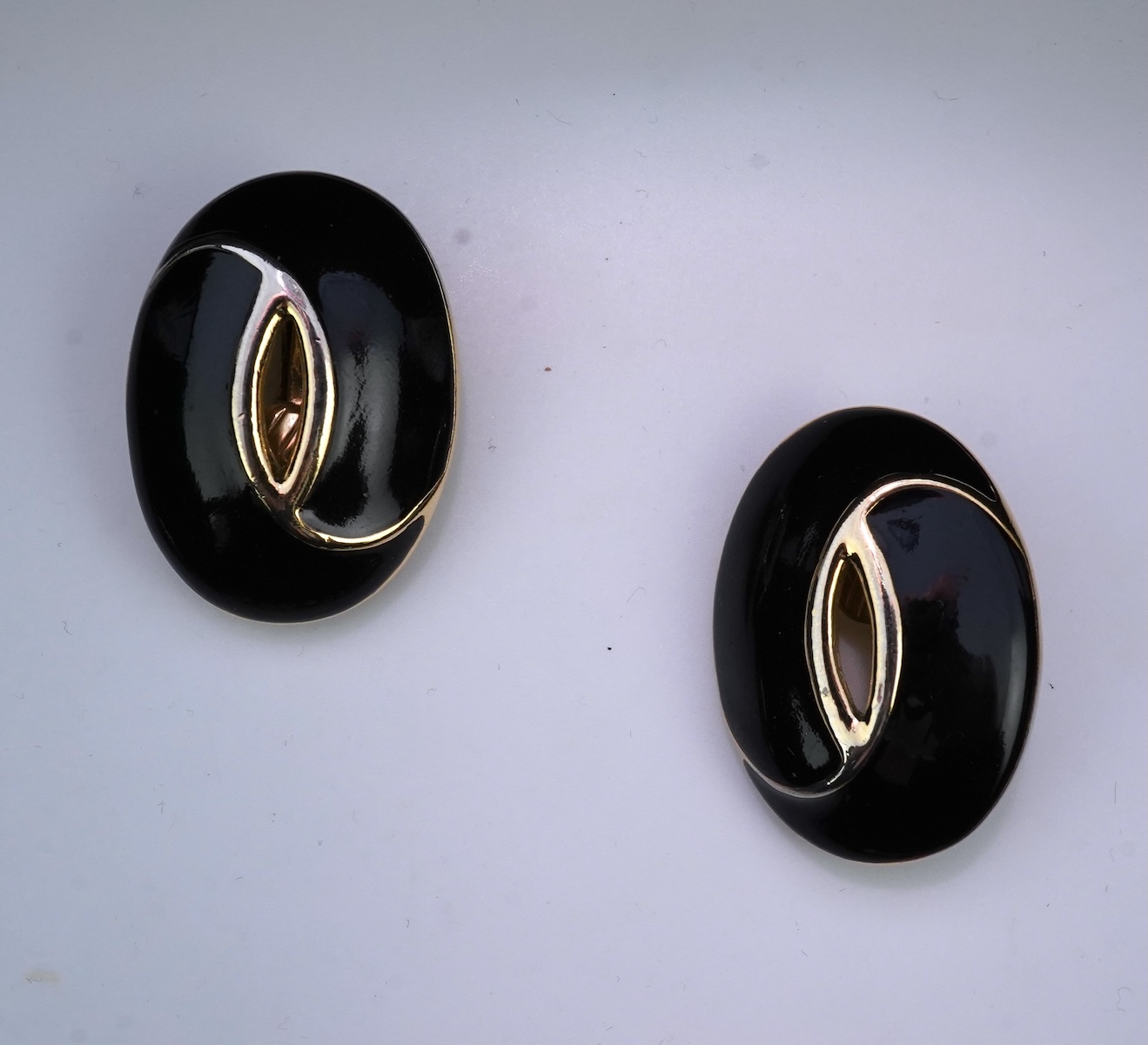 Two pairs of Givenchy clip earrings and four other pairs.